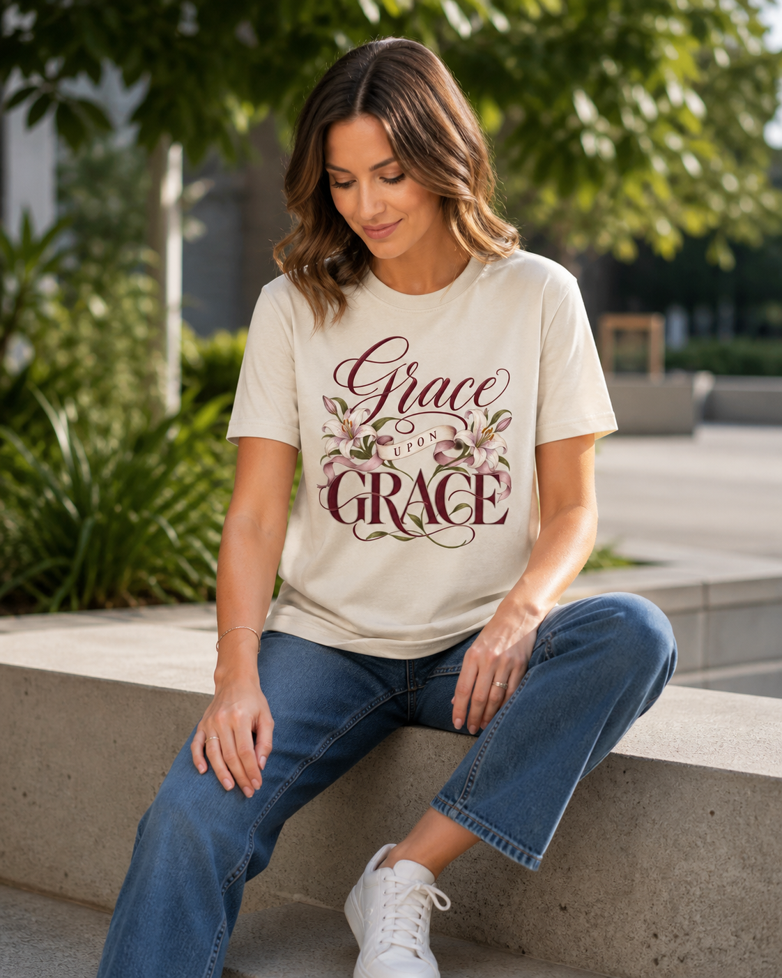 Woman wearing the Grace Upon Grace tee in a casual outdoor setting